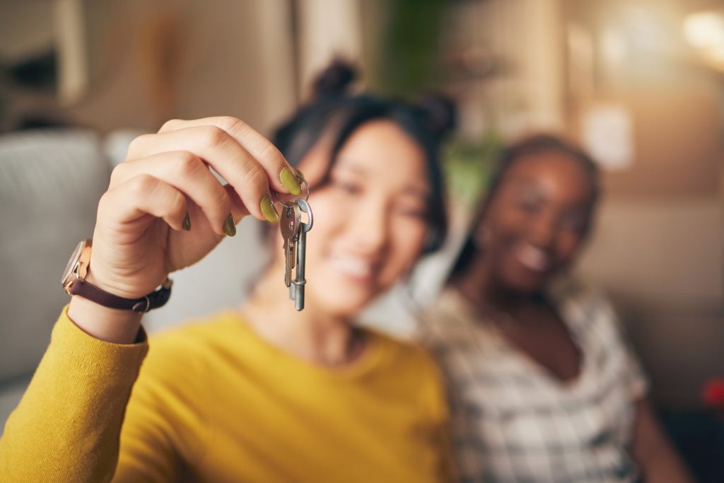 A couple holding a set of keys